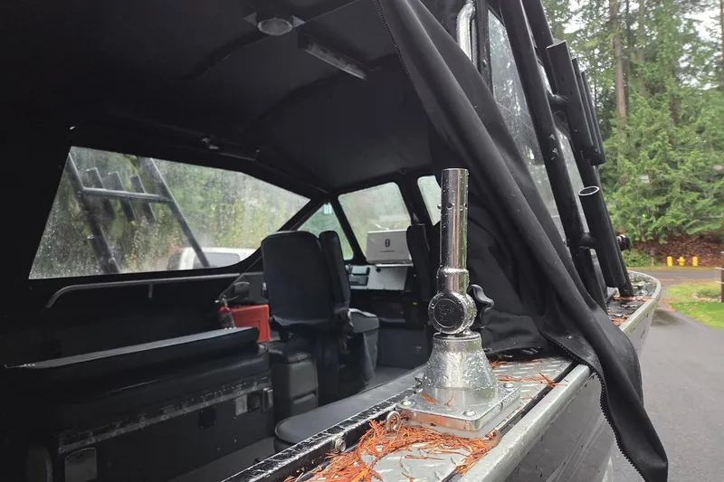 Slide: The Image of Interior view of a 2008 Alumaweld 22 Intruder boat with seating and equipment. - 5