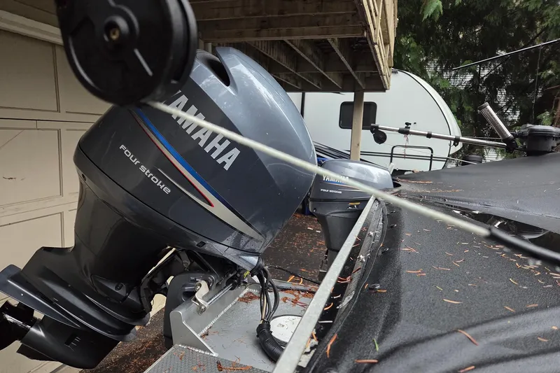 Slide: The Image of 2008 Alumaweld 22 Intruder boat with Yamaha four-stroke outboard motor. - 6