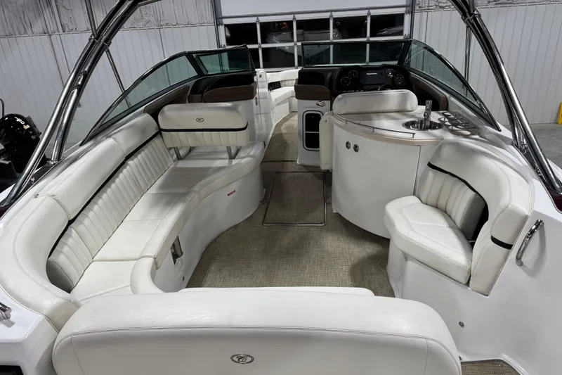Slide: The Image of Luxurious interior of a 2016 Cobalt 336 boat with white seating and modern amenities. - 13