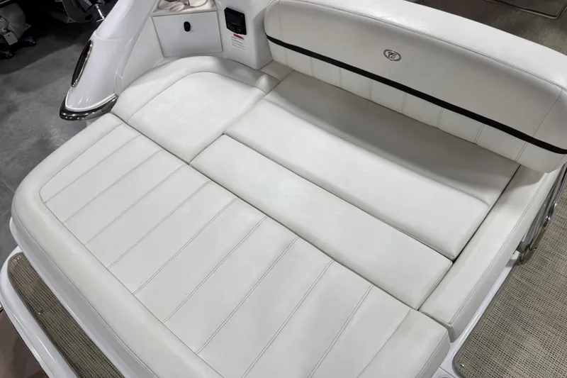 Slide: The Image of 2016 Cobalt 336 boat with white leather seating and sleek design. - 14