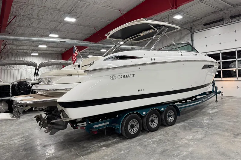Slide: The Image of 2016 Cobalt 336 boat on trailer in indoor storage facility. - 3