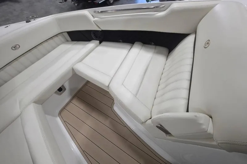 Slide: The Image of Luxurious seating area on a 2016 Cobalt 336 boat with white upholstery. - 44