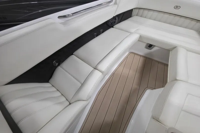 Slide: The Image of Luxurious interior of 2016 Cobalt 336 boat with white leather seating and wood flooring. - 45