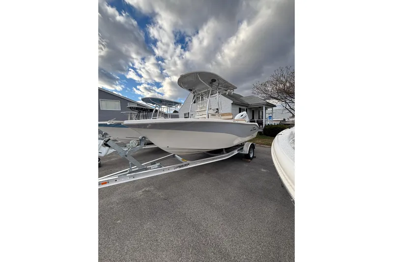 The Image of 2023 Sea Chaser 20 HFC boat on trailer under cloudy sky. - 1