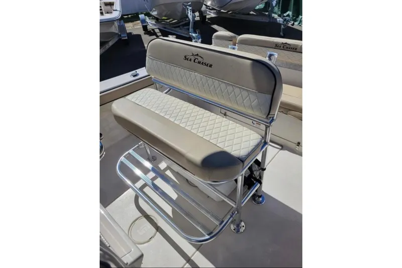 Slide: The Image of 2023 Sea Chaser 22 HFC boat seat with diamond-pattern upholstery and chrome frame. - 10
