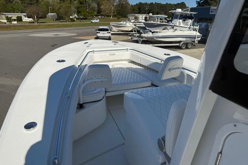 Slide: The Image of 2025 Pair Customs 28 Center Console boat with luxurious seating and sleek design. - 16