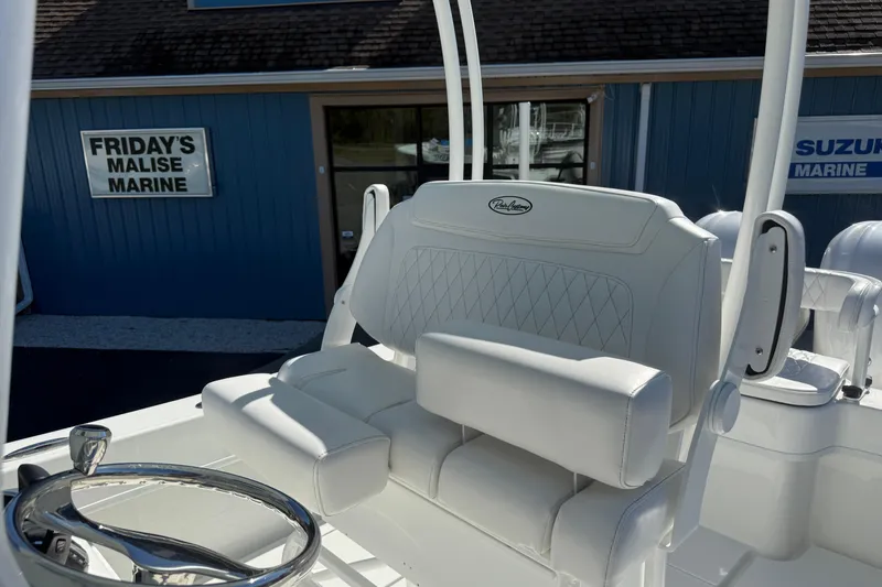 Slide: The Image of 2025 Pair Customs 28 Center Console boat with white seating at Friday's Malise Marine. - 9