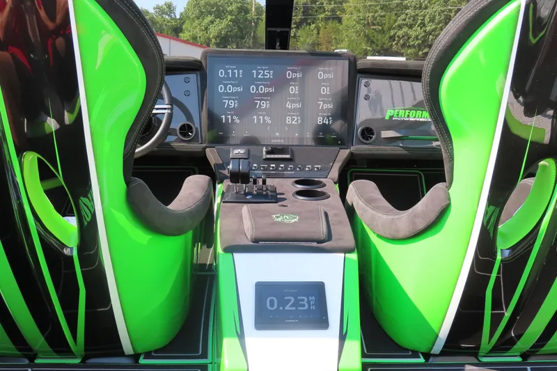 Slide: The Image of Interior of 2025 Performance Powerboats P360 with advanced dashboard and steering wheel. - 10
