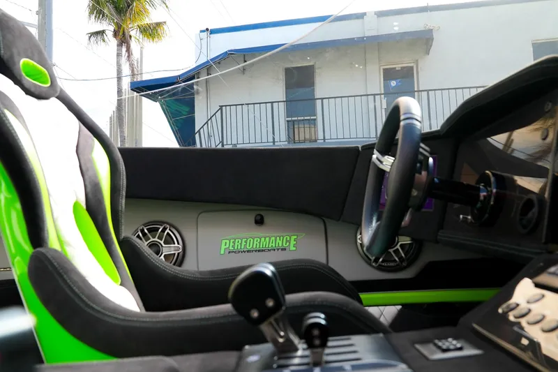 Slide: The Image of Interior of 2025 Performance Powerboats P360, featuring sleek design and vibrant green accents. - 20