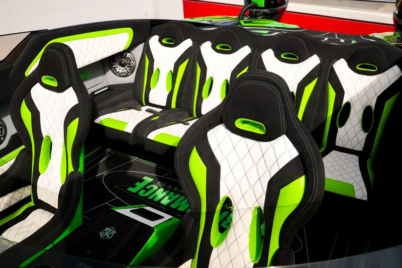 Slide: The Image of Interior of 2025 Performance Powerboats P360 with vibrant green and white seating. - 26