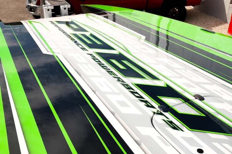 Slide: The Image of 2025 Performance Powerboats P360 with vibrant green and black design. - 28