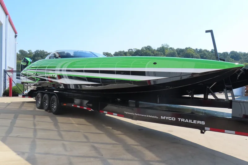 Slide: The Image of 2025 Performance Powerboats P360 in vibrant green, speeding across water. - 3