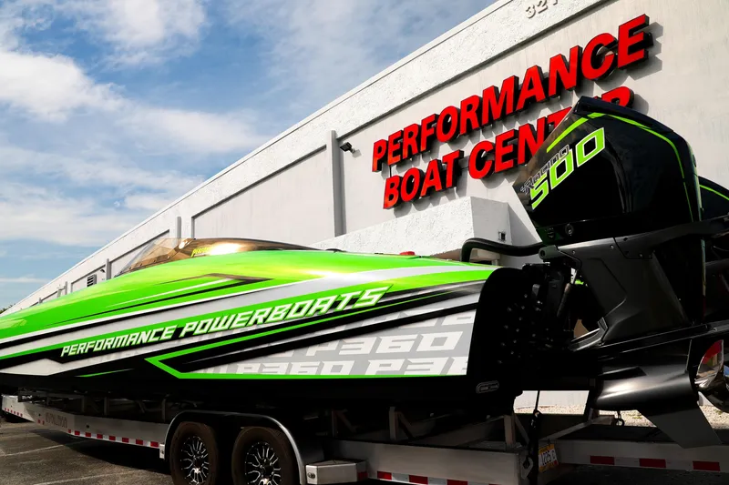 Slide: The Image of 2025 Performance Powerboats P360 in vibrant green at Performance Boat Center. - 37