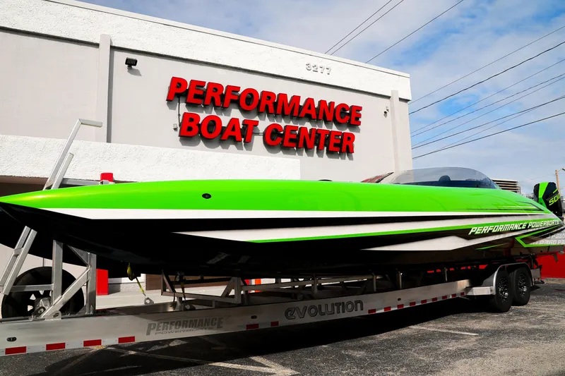 Slide: The Image of 2025 Performance Powerboats P360 in vibrant green at Performance Boat Center. - 38