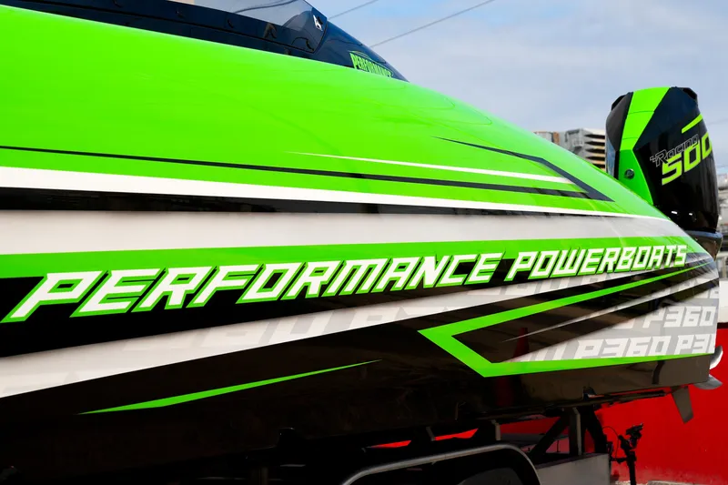 Slide: The Image of 2025 Performance Powerboats P360, vibrant green design, sleek racing style. - 39