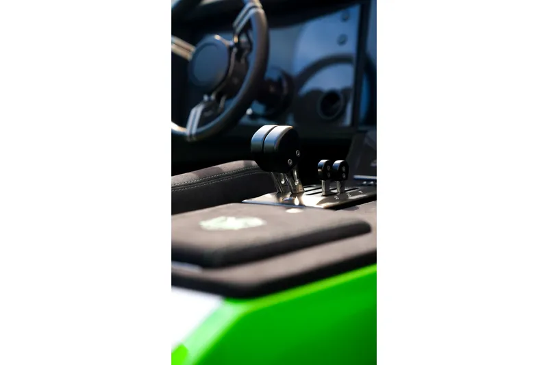 Slide: The Image of Interior of 2025 Performance Powerboats P360, featuring sleek controls and steering wheel. - 45