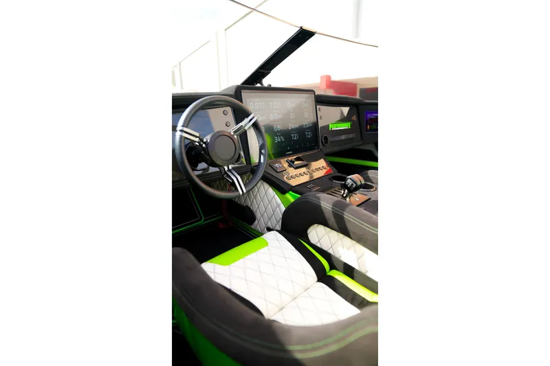 Slide: The Image of Interior of 2025 Performance Powerboats P360 with modern dashboard and steering wheel. - 49