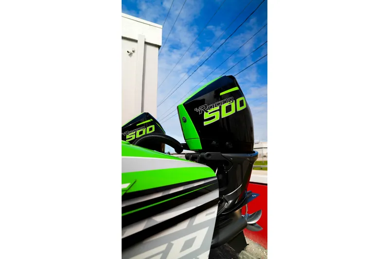 Slide: The Image of 2025 Performance Powerboats P360 with Racing 500 engine, vibrant green and black design. - 59