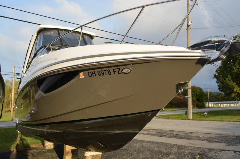 Slide: The Image of 2016 Regal 28 Express boat on display, showcasing sleek design and registration number OH 0978 FZ. - 5