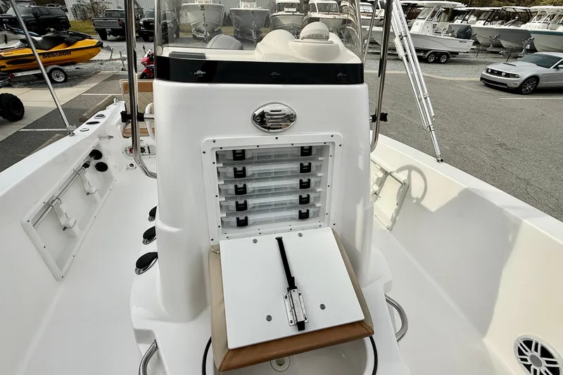 Slide: The Image of 2025 NauticStar 191 Hybrid boat interior with storage compartments and seating. - 14