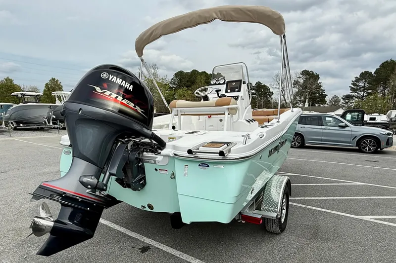 Slide: The Image of 2025 NauticStar 191 Hybrid boat with Yamaha VMAX engine on trailer. - 8