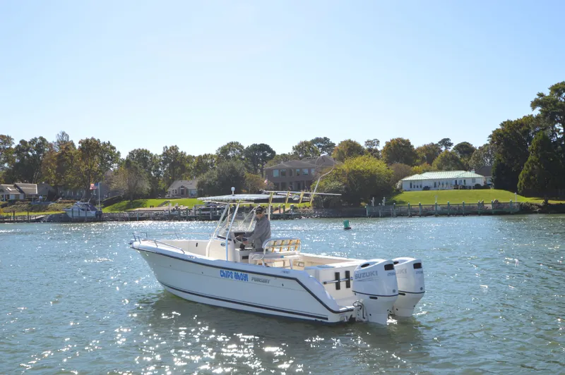 Slide: The Image of Pursuit 2670 CC with 2025 Suzuki 200's 2005 - 4