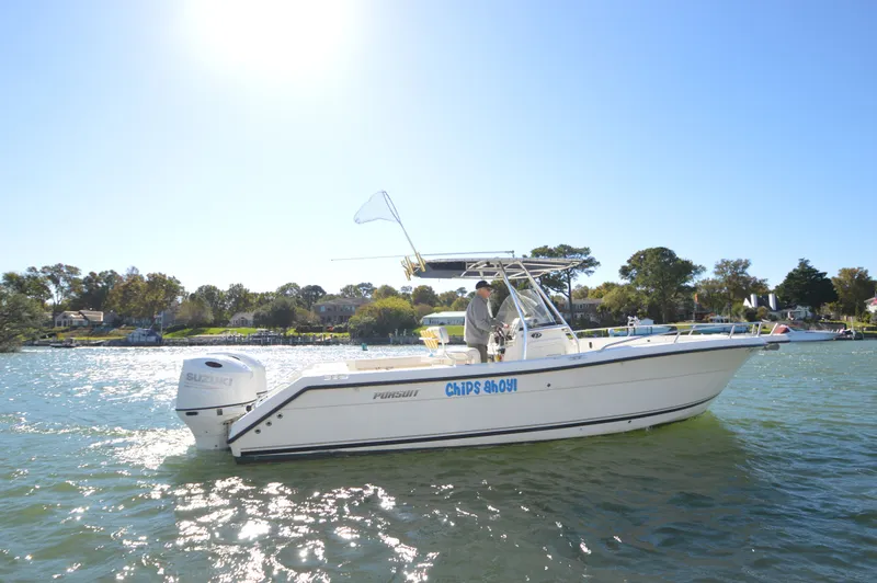 Slide: The Image of Pursuit 2670 CC with 2025 Suzuki 200's 2005 - 9