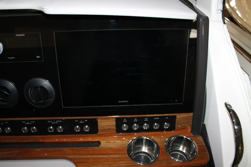 Slide: The Image of Dashboard of 2022 Tiara Yachts 43 LS with Garmin display and controls. - 14