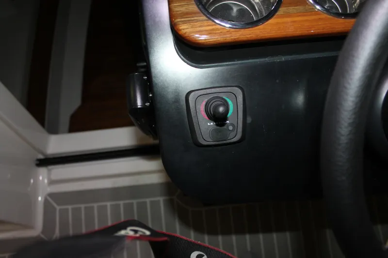 Slide: The Image of Control panel of 2022 Tiara Yachts 43 LS with joystick lever. - 15