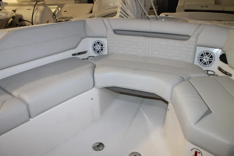 Slide: The Image of Luxurious seating area on 2022 Tiara Yachts 43 LS with modern design and speakers. - 23