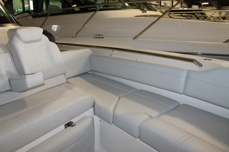 Slide: The Image of Luxurious seating on 2022 Tiara Yachts 43 LS, featuring elegant white upholstery. - 24
