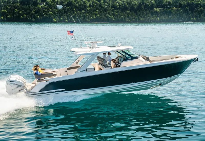 Slide: The Image of Manufacturer Provided Image: 2022 Tiara Yachts 43 LS cruising on a lake with passengers onboard. - 37