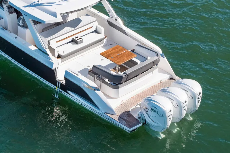 Slide: The Image of Manufacturer Provided Image: 2022 Tiara Yachts 43 LS with triple Yamaha outboard engines on the water. - 40