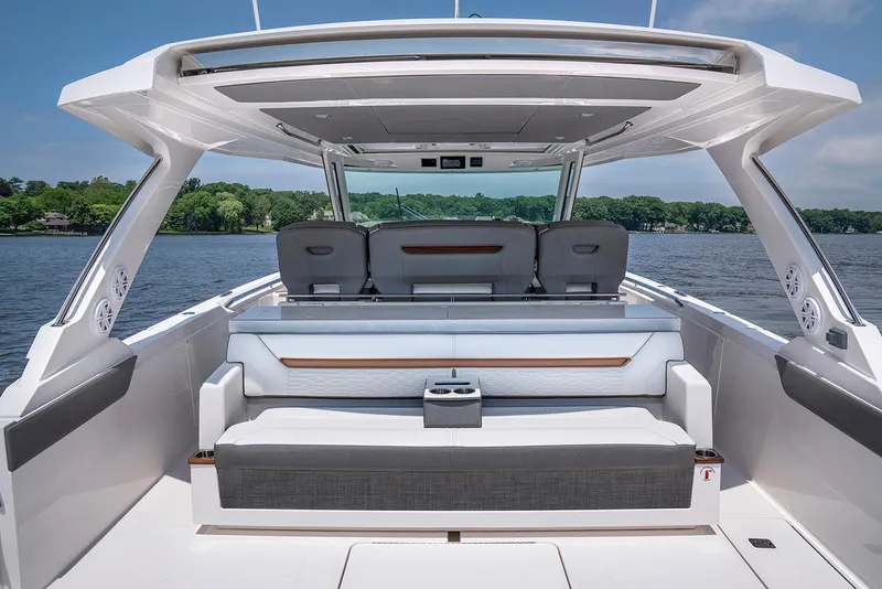 Slide: The Image of Manufacturer Provided Image: 2022 Tiara Yachts 43 LS luxury boat interior with seating and scenic water view. - 44