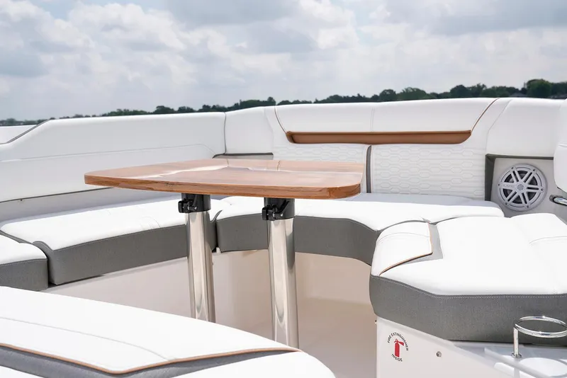 Slide: The Image of Manufacturer Provided Image: 2022 Tiara Yachts 43 LS boat interior with white seating and wooden table. - 48