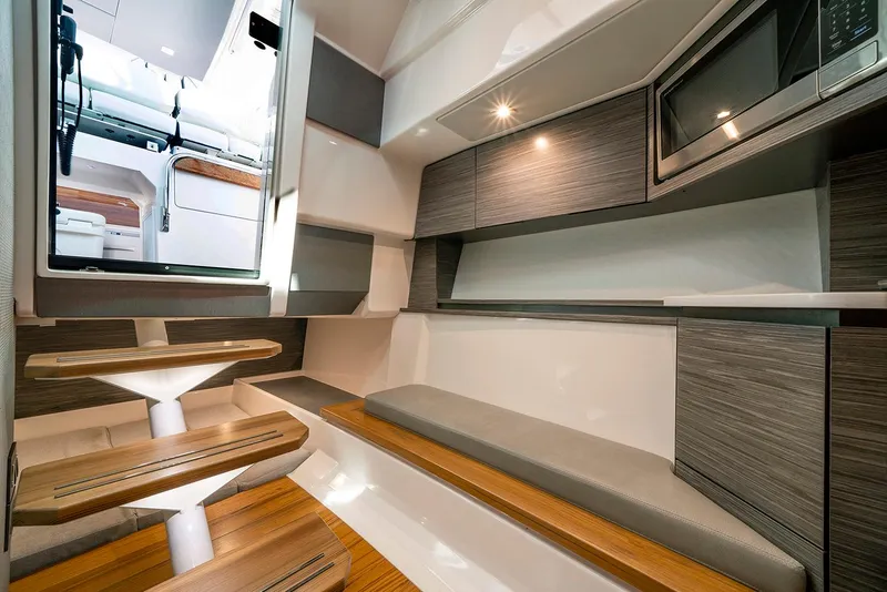 Slide: The Image of Manufacturer Provided Image: 2022 Tiara Yachts 43 LS interior cabin with modern design and wooden accents. - 51