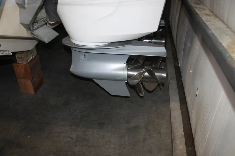 Slide: The Image of 2022 Tiara Yachts 43 LS propeller and lower unit in storage. - 78