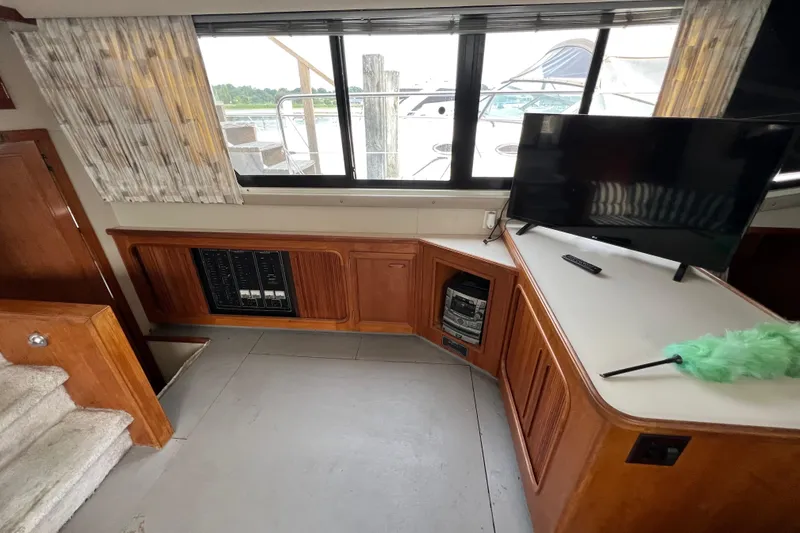 Slide: The Image of Interior of 1988 Carver 3807 Aft Cabin Motor Yacht with TV and control panel. - 20