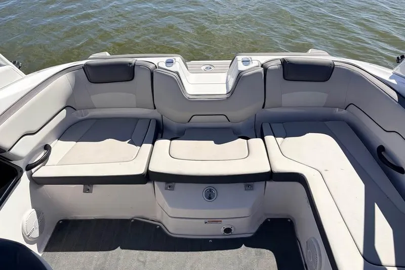 Slide: The Image of 2024 Yamaha Boats AR190 interior seating with water view. - 9