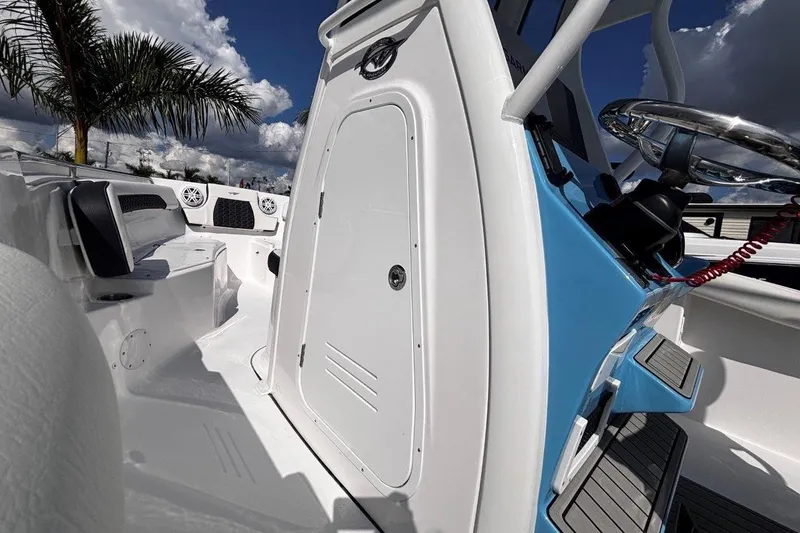 Slide: The Image of 2026 Tidewater 232 CC Adventure boat interior with sleek design and modern features. - 21