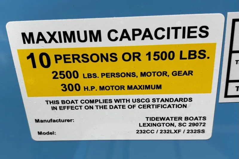 Slide: The Image of Maximum capacity label for 2026 Tidewater 232 CC Adventure boat, 10 persons or 1500 lbs. - 32