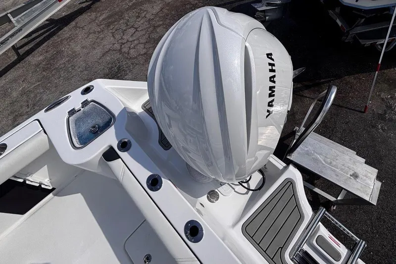 Slide: The Image of Tidewater 232 CC Adventure 2026 boat with Yamaha outboard engine, top view. - 9
