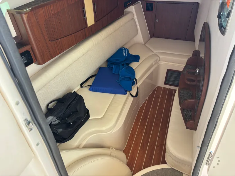 Slide: The Image of 2019 Grady-White Freedom 375 cabin interior with seating and storage. - 25