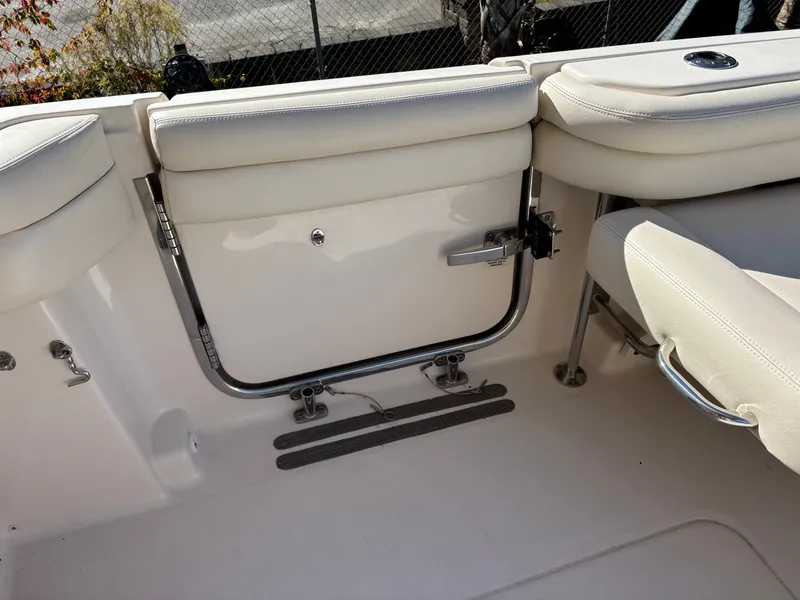 Slide: The Image of 2019 Grady-White Freedom 375 boat interior with cushioned seating and stainless steel fittings. - 34