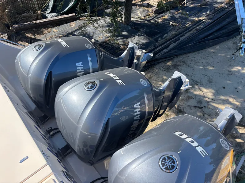 Slide: The Image of Three Yamaha 300 outboard engines on a 2019 Grady-White Freedom 375 boat. - 36