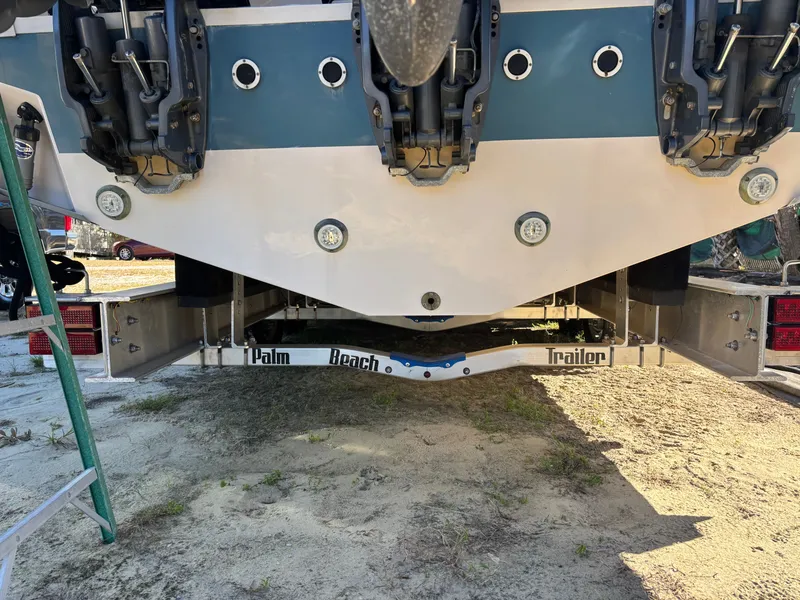 Slide: The Image of Rear view of a 2019 Grady-White Freedom 375 boat on a Palm Beach trailer. - 37