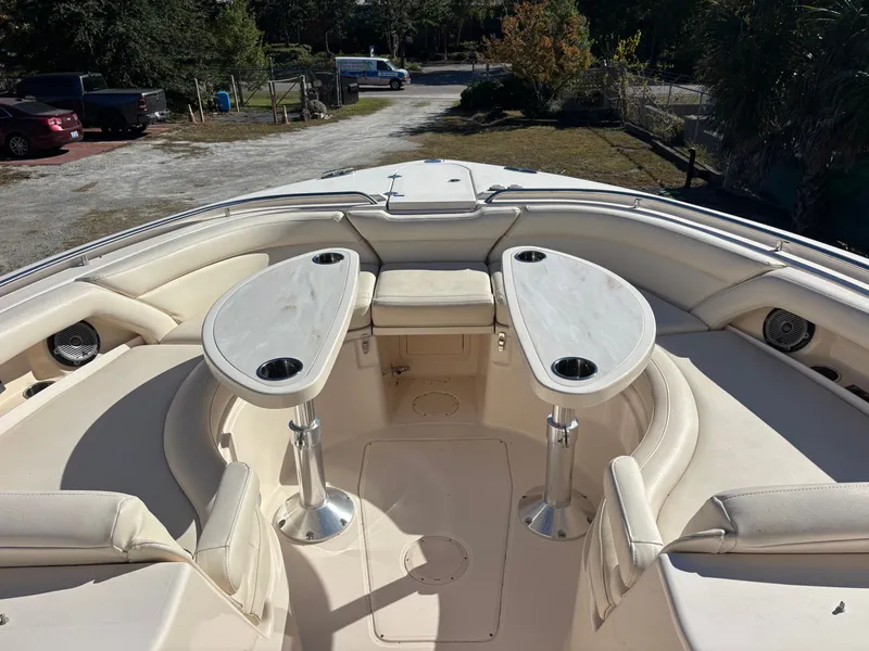 Slide: The Image of 2019 Grady-White Freedom 375 boat interior with seating and tables. - 5