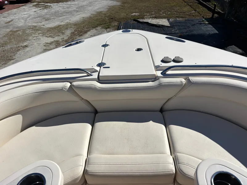 Slide: The Image of 2019 Grady-White Freedom 375 boat interior with cushioned seating and cup holders. - 8