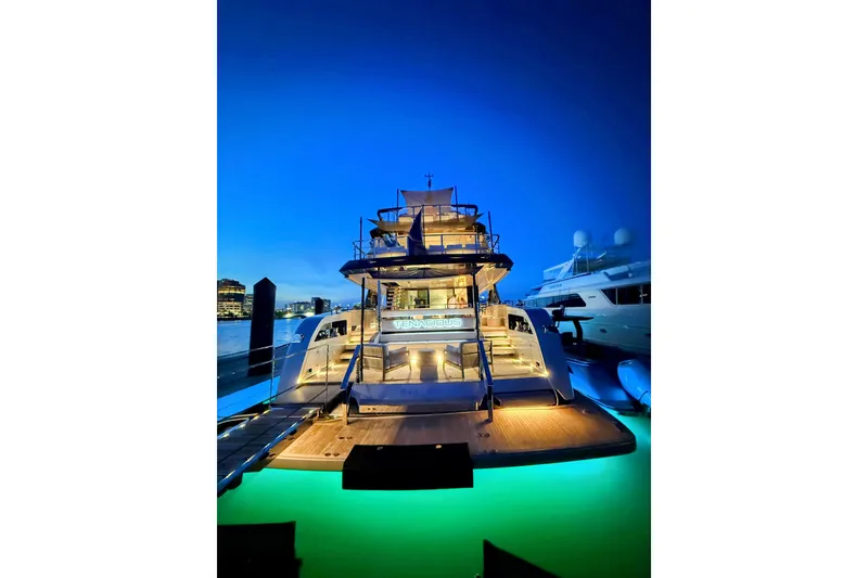 Slide: The Image of Aerial view of 2025 Riva 130' Bellissima yacht on turquoise water. - 10