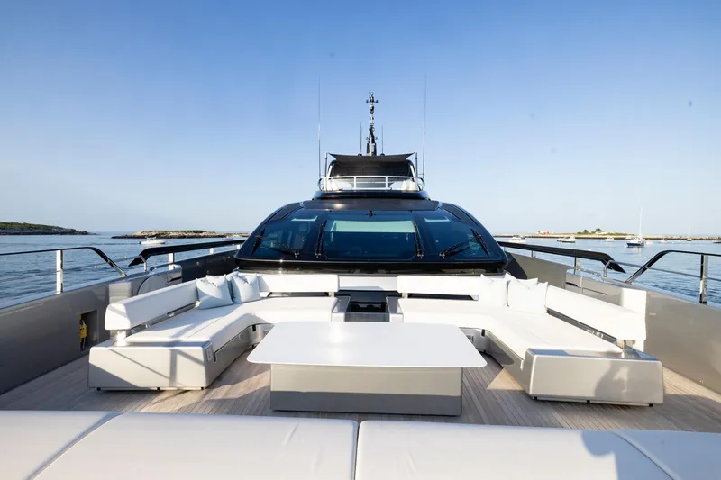 Slide: The Image of 2025 Riva 130' Bellissima yacht cruising on blue ocean waters. - 16